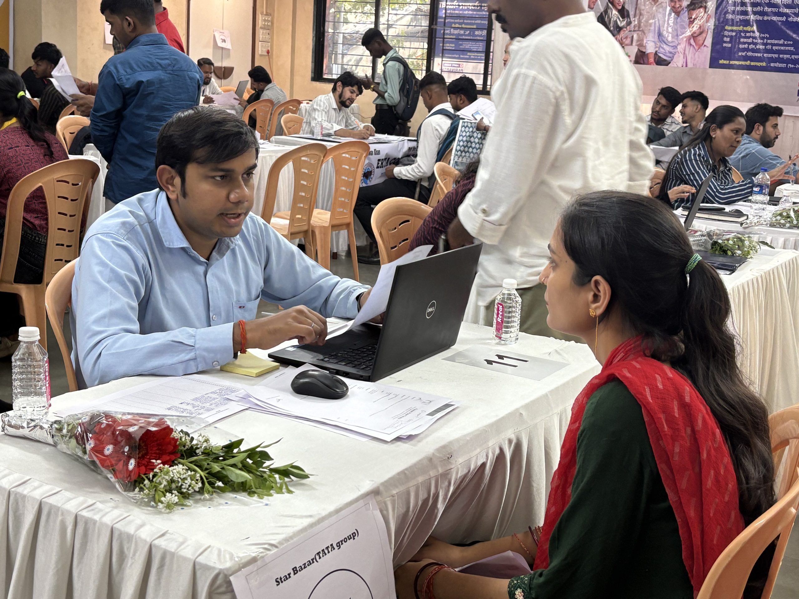 Candidates engage in one-on-one discussions with recruiters - YUVA & HDFC Bank Job Fair